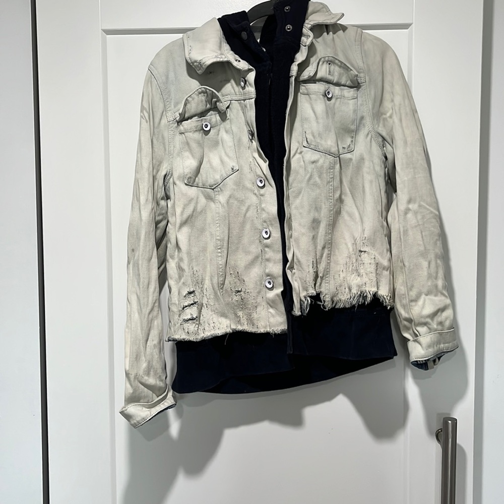 Oversized denim jacket with attached hoodie.